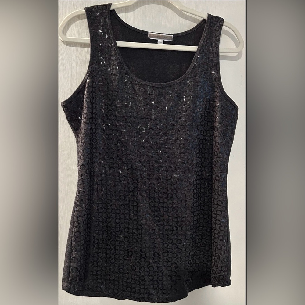 Black Sequin Sleeveless Top

Ladies Pleione Sleeveless Sparkly Top  Size XL